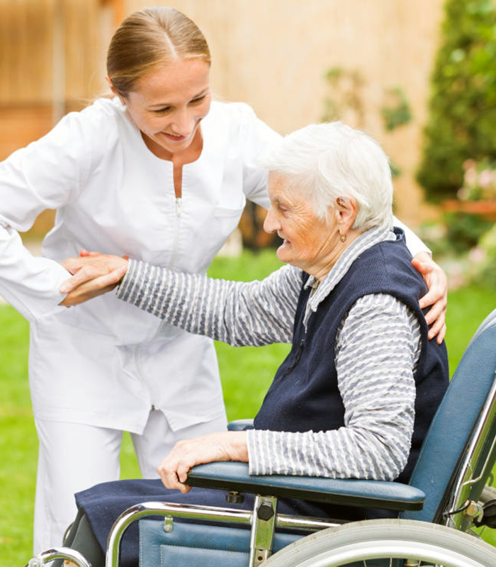 woman in wheelchair at home